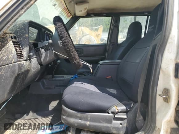 ✅ 1999 Jeep Cherokee Sport • VIN: 1J4FT68S0XL589158 • Lot: 71464305. Listed on Copart with Not provided. Free auction sales archive from the USA and detailed vehicle history report at DreamBid. Image 7.