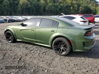✅ 2022 Dodge Charger Scat Pack Widebody • VIN: 2C3CDXGJ8NH180439 • Лот: 85277695. Опубликован ранее на Copart с пробегом 28 033 миль. Бесплатный доступ к архиву аукционных продаж из США и подробный отчёт об истории автомобиля на DreamBid. Изображение 2.