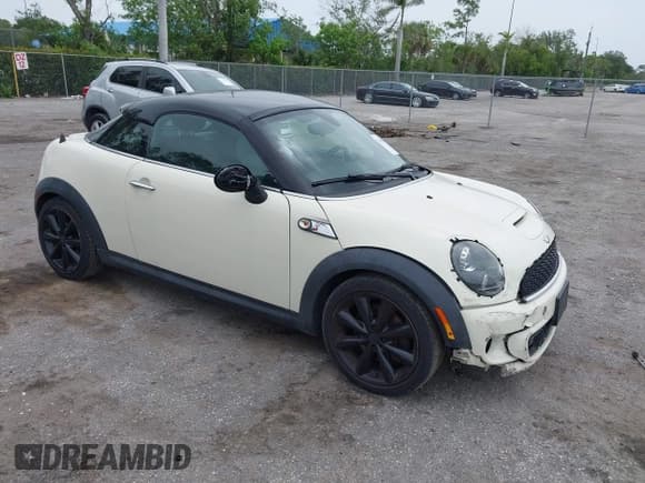 ✅ 2013 MINI Coupe S • VIN: WMWSX3C53DT408734 • Lot: 42437985. Listed on IAAI with 141,257 mi. Free auction sales archive from the USA and detailed vehicle history report at DreamBid. Image 1.