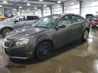 ✅ 2011 Chevrolet Cruze LS • VIN: 1G1PC5SH2B7126630 • Lot: 69132675. Listed on Copart with 136,760 mi. Free auction sales archive from the USA and detailed vehicle history report at DreamBid. Image 1.
