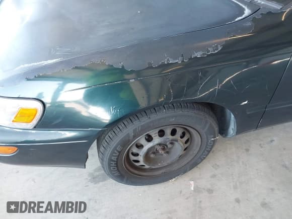 ✅ 1997 Toyota Corolla • VIN: 1NXBA02E7VZ525731 • Лот: 42598348. Опубликован ранее на IAAI с пробегом 257 585 миль. Бесплатный доступ к архиву аукционных продаж из США и подробный отчёт об истории автомобиля на DreamBid. Изображение 13.