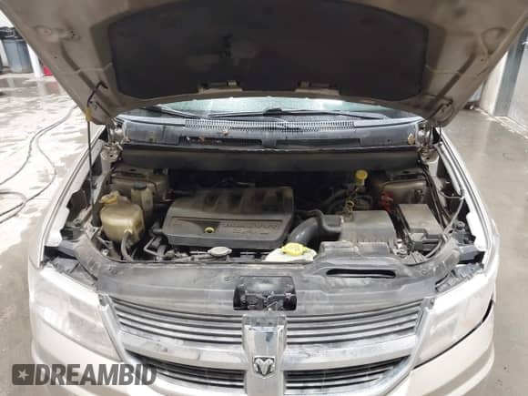 2009 Dodge Journey SE z VIN 3D4GG47B99T561583, wystawiony jako IAAI lot #43402002 z przebiegiem 137 189 mil mil oraz . Historia ofert i sprzedaży dostępna na DreamBid. Obrazek 10.