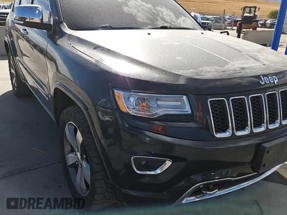 ✅ 2015 Jeep Grand Cherokee Overland • VIN: 1C4RJFCM9FC762451 • Lot: 80275465. Listed on Copart with 138,061 mi. Free auction sales archive from the USA and detailed vehicle history report at DreamBid. Image 14.
