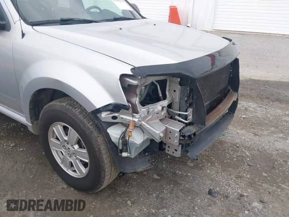 2010 Mercury Mariner with VIN 4M2CN8B76AKJ09411, listed as a IAAI auction lot 42386510 with 113,126 mi miles and . Bid and sale history available at DreamBid. Image 12.