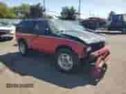 1997 Chevrolet Blazer with VIN 1GNCT18W0VK171160, listed as a Copart auction lot 80494125 with 207,795 mi miles and Salvage title. Bid and sale history available at DreamBid. Image 4.