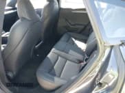 ✅ 2021 Tesla Model S Plaid • VIN: 5YJSA1E61MF435321 • Lot: 41832006. Listed on IAAI with 23,361 mi. Free auction sales archive from the USA and detailed vehicle history report at DreamBid. Image 8.