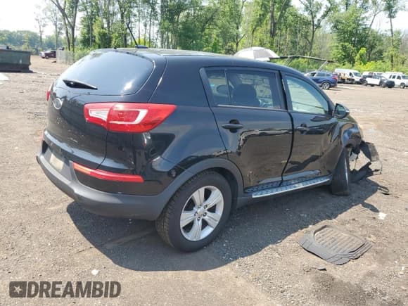 ✅ 2012 Kia Sportage LX • VIN: KNDPB3A20C7317881 • Lot: 59814355. Listed on Copart with 94,938 mi. Free auction sales archive from the USA and detailed vehicle history report at DreamBid. Image 3.