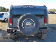 ✅ 2005 Hummer H2 SUV • VIN: 5GRGN23U25H132291 • Lot: 91858815. Wystawiony na Copart z przebiegiem 263 905 mil. Bezpłatny archiwum sprzedaży aukcyjnych z USA i szczegółowy raport historii pojazdu na DreamBid. Zdjęcie 6.