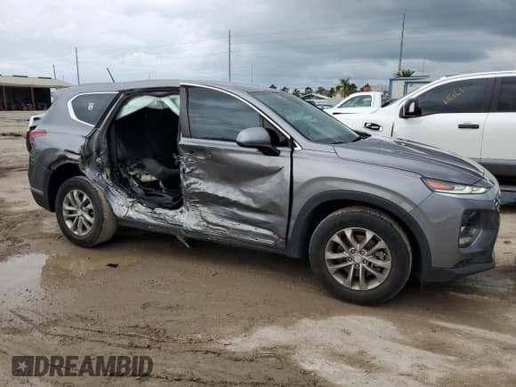 ✅ 2019 Hyundai Santa Fe SE • VIN: 5NMS23AD1KH012795 • Lot: 45775094. Wystawiony na Copart z przebiegiem 94 824 mil. Bezpłatny archiwum sprzedaży aukcyjnych z USA i szczegółowy raport historii pojazdu na DreamBid. Zdjęcie 4.