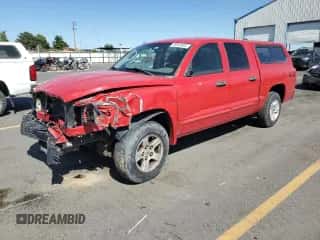 2005 Dodge Dakota SLT с VIN 1D7HW48N65S237912, выставлен на аукционе Copart как лот 66043685 с пробегом 242 912 миль миль и Списание • Salvage title. История ставок и продаж доступна на DreamBid. Изображение 1.