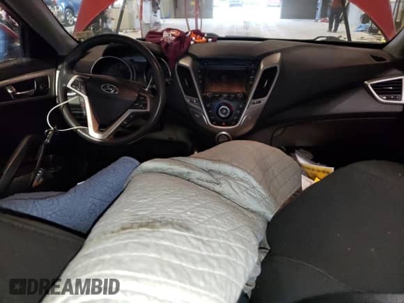 2015 Hyundai Veloster z VIN KMHTC6AD1FU228644, wystawiony jako Copart lot #70176233 z przebiegiem 117 359 mil mil oraz . Historia ofert i sprzedaży dostępna na DreamBid. Obrazek 8.