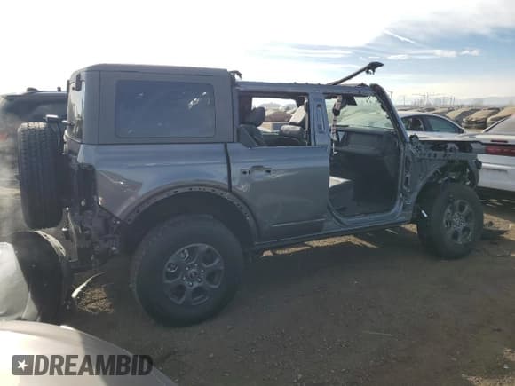 ✅ 2024 Ford Bronco Big Bend • VIN: 1FMDE7BH9RLA85832 • Лот: 86171994. Опубликован ранее на Copart с пробегом 1 196 миль. Бесплатный доступ к архиву аукционных продаж из США и подробный отчёт об истории автомобиля на DreamBid. Изображение 3.