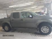 ✅ 2018 Nissan Frontier SV • VIN: 1N6AD0EV7JN763356 • Lot: 43017834. Listed on IAAI with 96,927 mi. Free auction sales archive from the USA and detailed vehicle history report at DreamBid. Image 14.