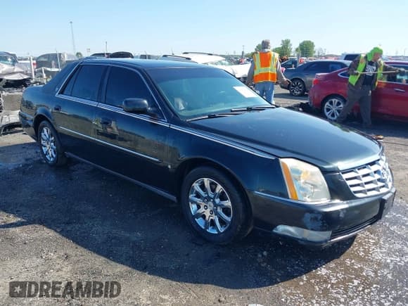 ✅ 2008 Cadillac DTS 1SC • VIN: 1G6KD57Y08U184384 • Lot: 41974882. Listed on IAAI with 158,372 mi. Free auction sales archive from the USA and detailed vehicle history report at DreamBid. Image 1.