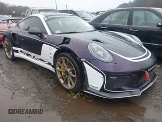 ✅ 2019 Porsche 911 GT3 RS • VIN: WP0AF2A95KS164766 • Lot: 43843760. Listed on IAAI with 18,550 mi. Free auction sales archive from the USA and detailed vehicle history report at DreamBid. Image 1.