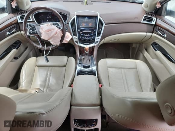 ✅ 2016 Cadillac SRX Premium Collection • VIN: 3GYFNDE39GS546265 • Lot: 65597945. Wystawiony na Copart z przebiegiem 145 591 mil. Bezpłatny archiwum sprzedaży aukcyjnych z USA i szczegółowy raport historii pojazdu na DreamBid. Zdjęcie 8.