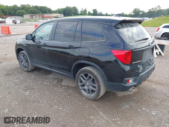 ✅ 2023 Honda Passport EX-L • VIN: 5FNYF8H56PB020149 • Lot: 42777091. Listed on IAAI with 39,419 mi. Free auction sales archive from the USA and detailed vehicle history report at DreamBid. Image 3.