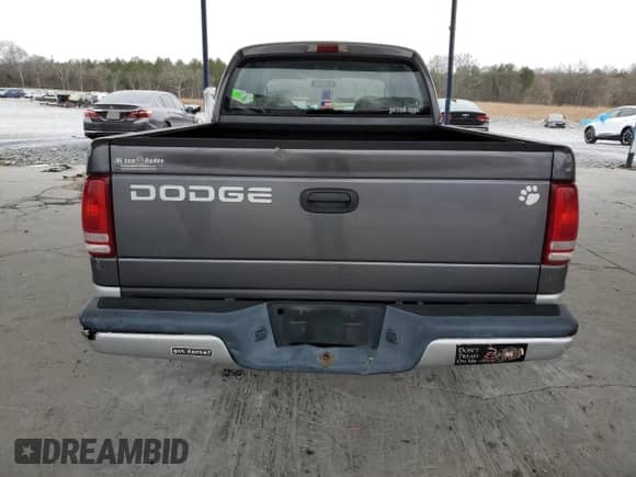 2002 Dodge Dakota SLT z VIN 1B7HL48X32S708723, wystawiony jako Copart lot #41940825 z przebiegiem 112 145 mil mil oraz Szkoda całkowita • Salvage title. Historia ofert i sprzedaży dostępna na DreamBid. Obrazek 6.