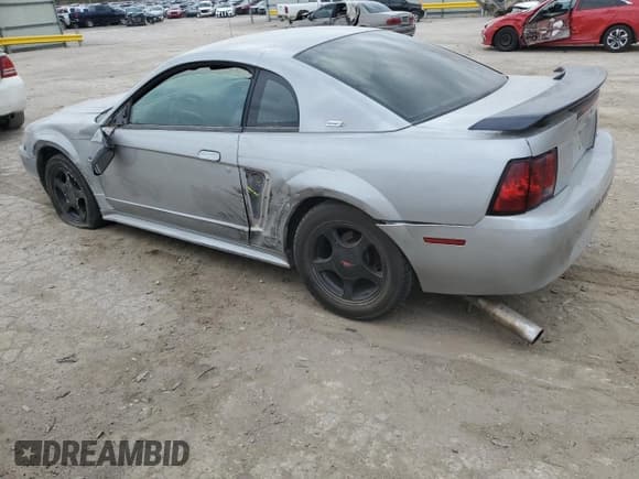 ✅ 2001 Ford Mustang Standard • VIN: 1FAFP40401F200672 • Lot: 51295345. Listed on Copart with Not provided. Free auction sales archive from the USA and detailed vehicle history report at DreamBid. Image 2.