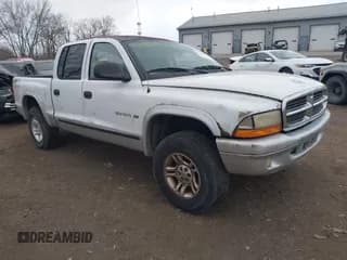 ✅ 2002 Dodge Dakota SLT • VIN: 1B7HG48N72S577296 • Lot: 41848637. Wystawiony na IAAI z przebiegiem 133 777 mil. Bezpłatny archiwum sprzedaży aukcyjnych z USA i szczegółowy raport historii pojazdu na DreamBid. Zdjęcie 1.