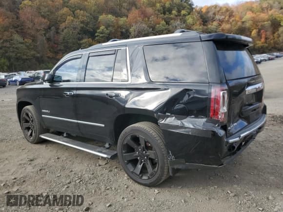 ✅ 2017 GMC Yukon Denali • VIN: 1GKS2CKJ8HR285603 • Lot: 90018015. Listed on Copart with 115,002 mi. Free auction sales archive from the USA and detailed vehicle history report at DreamBid. Image 2.