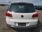 ✅ 2013 Volkswagen Tiguan SE • VIN: WVGBV7AX7DW512304 • Lot: 55928365. Listed on Copart with 142,520 mi. Free auction sales archive from the USA and detailed vehicle history report at DreamBid. Image 6.