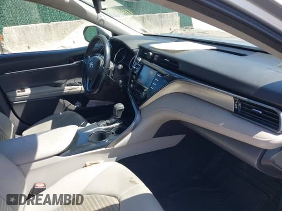 2019 Toyota Camry LE z VIN 4T1B11HK5KU719169, wystawiony jako IAAI lot #41972503 z przebiegiem 194 259 mil mil oraz . Historia ofert i sprzedaży dostępna na DreamBid. Obrazek 5.