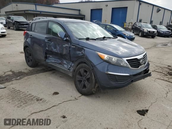 ✅ 2012 Kia Sportage LX • VIN: KNDPBCA28C7213736 • Lot: 92631695. Listed on Copart with 43,871 mi. Free auction sales archive from the USA and detailed vehicle history report at DreamBid. Image 4.