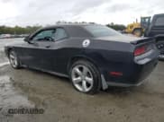 ✅ 2012 Dodge Challenger SXT • VIN: 2C3CDYAGXCH135275 • Lot: 77743634. Wystawiony na Copart z przebiegiem 122 422 mil. Bezpłatny archiwum sprzedaży aukcyjnych z USA i szczegółowy raport historii pojazdu na DreamBid. Zdjęcie 2.