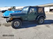 ✅ 2001 Jeep Wrangler SE • VIN: 1J4FA29P61P371265 • Lot: 91778765. Listed on Copart with 198,727 mi. Free auction sales archive from the USA and detailed vehicle history report at DreamBid. Image 1.
