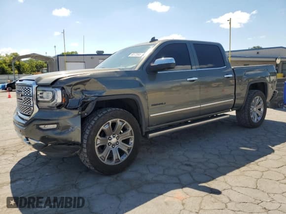 ✅ 2017 GMC Sierra 1500 Denali • VIN: 3GTU2PEJXHG185588 • Lot: 68372695. Listed on Copart with 131,793 mi. Free auction sales archive from the USA and detailed vehicle history report at DreamBid. Image 1.