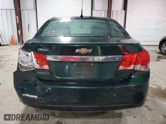 2014 Chevrolet Cruze LS z VIN 1G1PA5SH1E7209346, wystawiony jako Copart lot #90811405 z przebiegiem 90 309 mil mil oraz Szkoda całkowita • Salvage title. Historia ofert i sprzedaży dostępna na DreamBid. Obrazek 6.