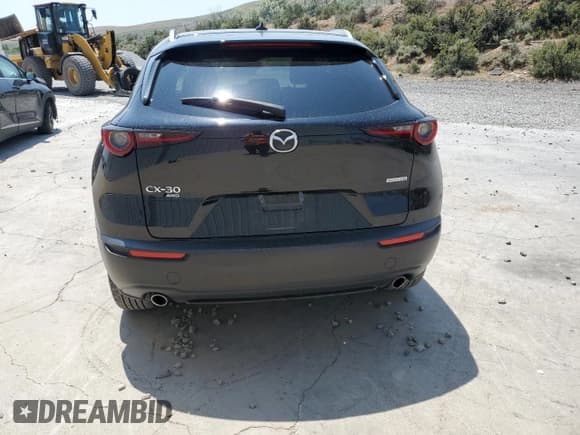 ✅ 2024 Mazda CX-30 S Premium • VIN: 3MVDMBDMXRM682702 • Lot: 59981805. Listed on Copart with 21,505 mi. Free auction sales archive from the USA and detailed vehicle history report at DreamBid. Image 6.