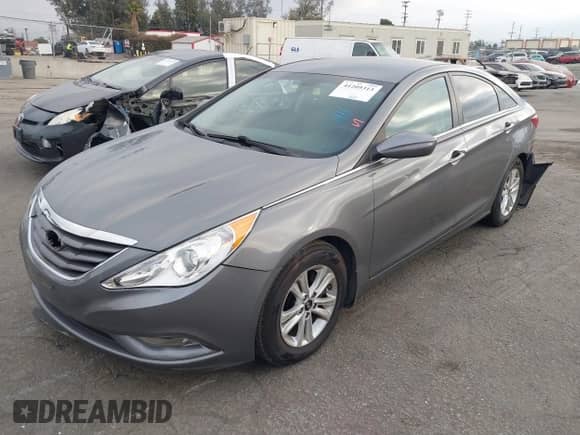 2013 Hyundai Sonata GLS with VIN 5NPEB4AC8DH782024, listed as a IAAI auction lot 41209313 with 128,794 mi miles and . Bid and sale history available at DreamBid. Image 2.