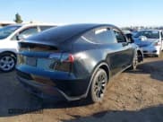 ✅ 2023 Tesla Model Y Long Range • VIN: 7SAYGDEE0PF907260 • Lot: 41180227. Listed on IAAI with Not provided. Free auction sales archive from the USA and detailed vehicle history report at DreamBid. Image 4.