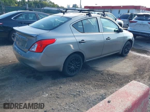 ✅ 2013 Nissan Versa SV • VIN: 3N1CN7AP2DL888622 • Lot: 43165398. Listed on IAAI with 112,065 mi. Free auction sales archive from the USA and detailed vehicle history report at DreamBid. Image 4.