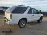 2003 Chevrolet Blazer LS z VIN 1GNCS18XX3K134514, wystawiony jako Copart lot #84811644 z przebiegiem 154 839 mil mil oraz Szkoda całkowita • Salvage title. Historia ofert i sprzedaży dostępna na DreamBid. Obrazek 3.