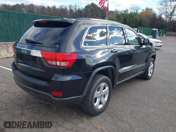 ✅ 2013 Jeep Grand Cherokee Laredo • VIN: 1C4RJFAG7DC502043 • Lot: 43733225. Wystawiony na IAAI z przebiegiem 150 382 mil. Bezpłatny archiwum sprzedaży aukcyjnych z USA i szczegółowy raport historii pojazdu na DreamBid. Zdjęcie 4.