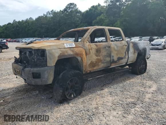 2017 Chevrolet Silverado 2500HD High Country с VIN 1GC1KXEY8HF206164, выставлен на аукционе Copart как лот 57169835 с пробегом Не указан миль и На запчасти • Non repairable. История ставок и продаж доступна на DreamBid. Изображение 1.