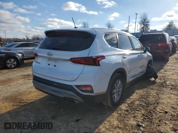 2019 Hyundai Santa Fe SE z VIN 5NMS23AD1KH102433, wystawiony jako Copart lot #71176022 z przebiegiem 70 051 mil mil oraz . Historia ofert i sprzedaży dostępna na DreamBid. Obrazek 3.