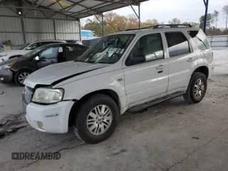 2006 Mercury Mariner Luxury z VIN 4M2CU56136DJ00202, wystawiony jako Copart lot #85121264 z przebiegiem 103 242 mil mil oraz Szkoda całkowita • Salvage title. Historia ofert i sprzedaży dostępna na DreamBid. Obrazek 1.
