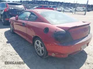 2006 Hyundai Tiburon GT с VIN KMHHN65F86U188431, выставлен на аукционе IAAI как лот 41808475 с пробегом 208 879 миль миль и . История ставок и продаж доступна на DreamBid. Изображение 3.