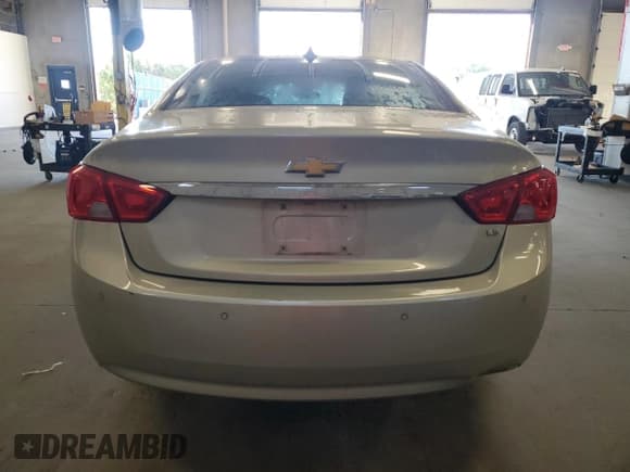✅ 2014 Chevrolet Impala LS • VIN: 2G11Y5SL0E9147653 • Lot: 81899815. Listed on Copart with 142,662 mi. Free auction sales archive from the USA and detailed vehicle history report at DreamBid. Image 6.