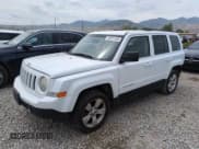 ✅ 2014 Jeep Patriot Latitude • VIN: 1C4NJRFB0ED760056 • Lot: 58931465. Listed on Copart with 192,469 mi. Free auction sales archive from the USA and detailed vehicle history report at DreamBid. Image 1.