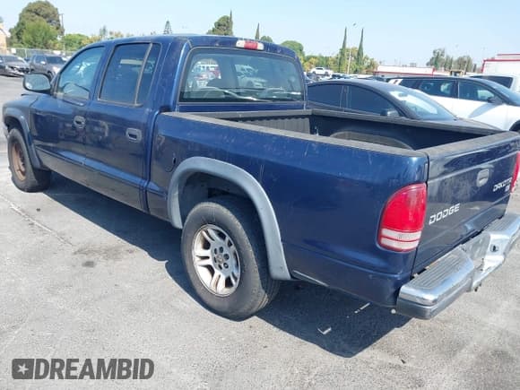 ✅ 2003 Dodge Dakota SLT • VIN: 1D7HL48X23S367452 • Lot: 42959947. Wystawiony na IAAI z przebiegiem 198 631 mil. Bezpłatny archiwum sprzedaży aukcyjnych z USA i szczegółowy raport historii pojazdu na DreamBid. Zdjęcie 3.