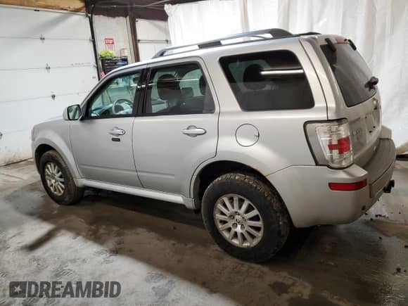 2010 Mercury Mariner Premier z VIN 4M2CN9HGXAKJ16116, wystawiony jako Copart lot #87076184 z przebiegiem 192 908 mil mil oraz Szkoda całkowita • Salvage title. Historia ofert i sprzedaży dostępna na DreamBid. Obrazek 2.