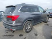 ✅ 2018 Honda Pilot EX-L • VIN: 5FNYF6H57JB014338 • Lot: 43791400. Listed on IAAI with 70,924 mi. Free auction sales archive from the USA and detailed vehicle history report at DreamBid. Image 4.