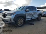 ✅ 2021 Honda Ridgeline RTL-E • VIN: 5FPYK3F74MB013450 • Lot: 55655845. Wystawiony na Copart z przebiegiem 43 697 mil. Bezpłatny archiwum sprzedaży aukcyjnych z USA i szczegółowy raport historii pojazdu na DreamBid. Zdjęcie 1.