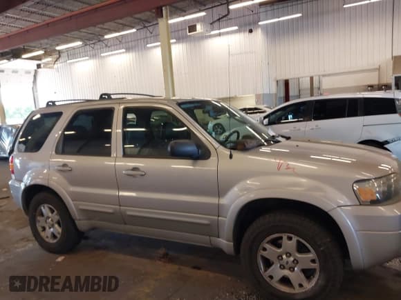 ✅ 2007 Ford Escape Limited • VIN: 1FMCU94197KA36921 • Lot: 40426720. Listed on IAAI with 177,909 mi. Free auction sales archive from the USA and detailed vehicle history report at DreamBid. Image 14.