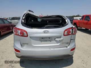 2010 Hyundai Santa Fe GLS с VIN 5NMSGDAB0AH416000, выставлен на аукционе Copart как лот 64804024 с пробегом 172 471 миль миль и На запчасти • Non repairable. История ставок и продаж доступна на DreamBid. Изображение 6.